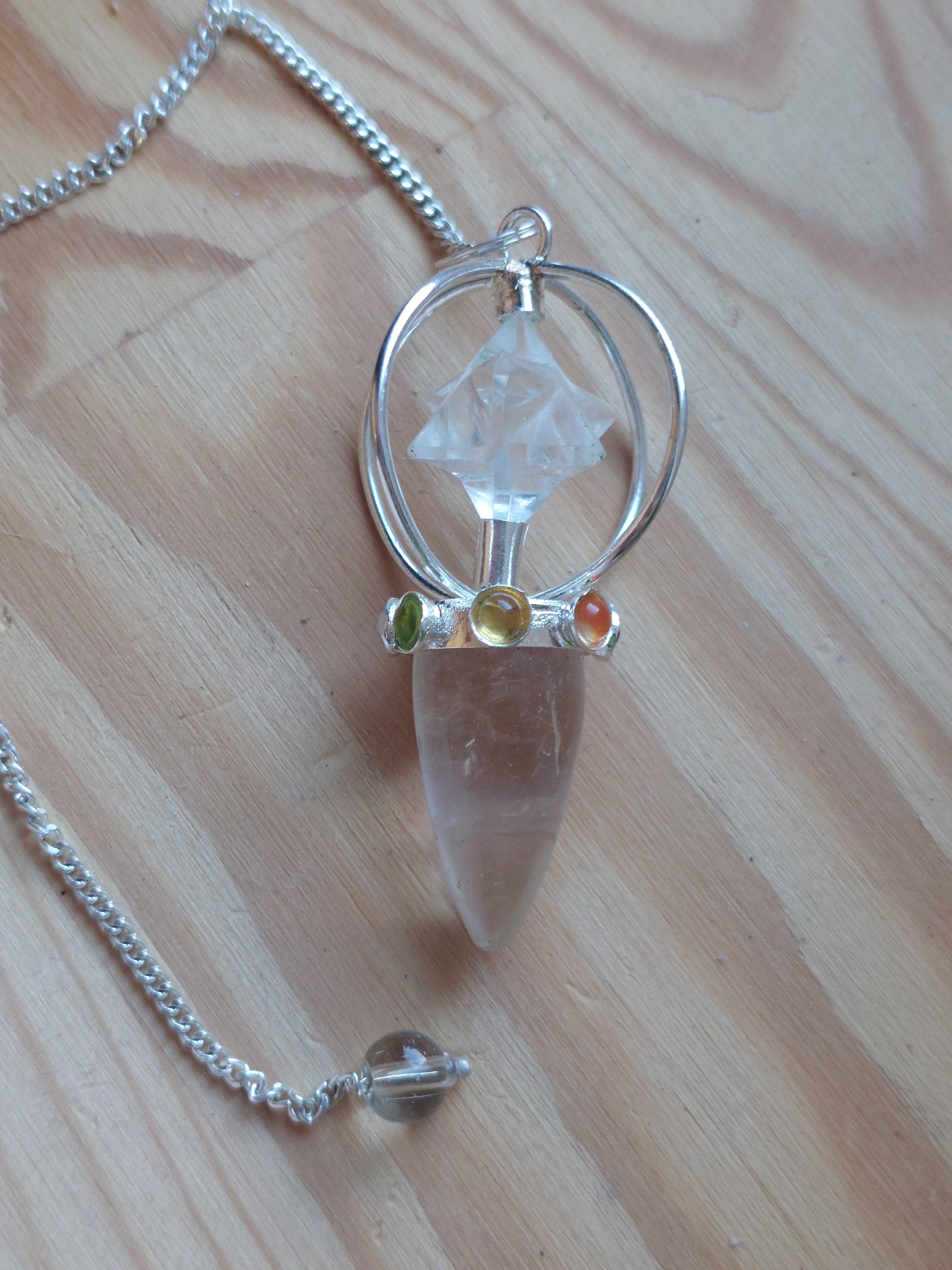 Clear Quartz Point Pendulum with Merkaba and 7 Stones
