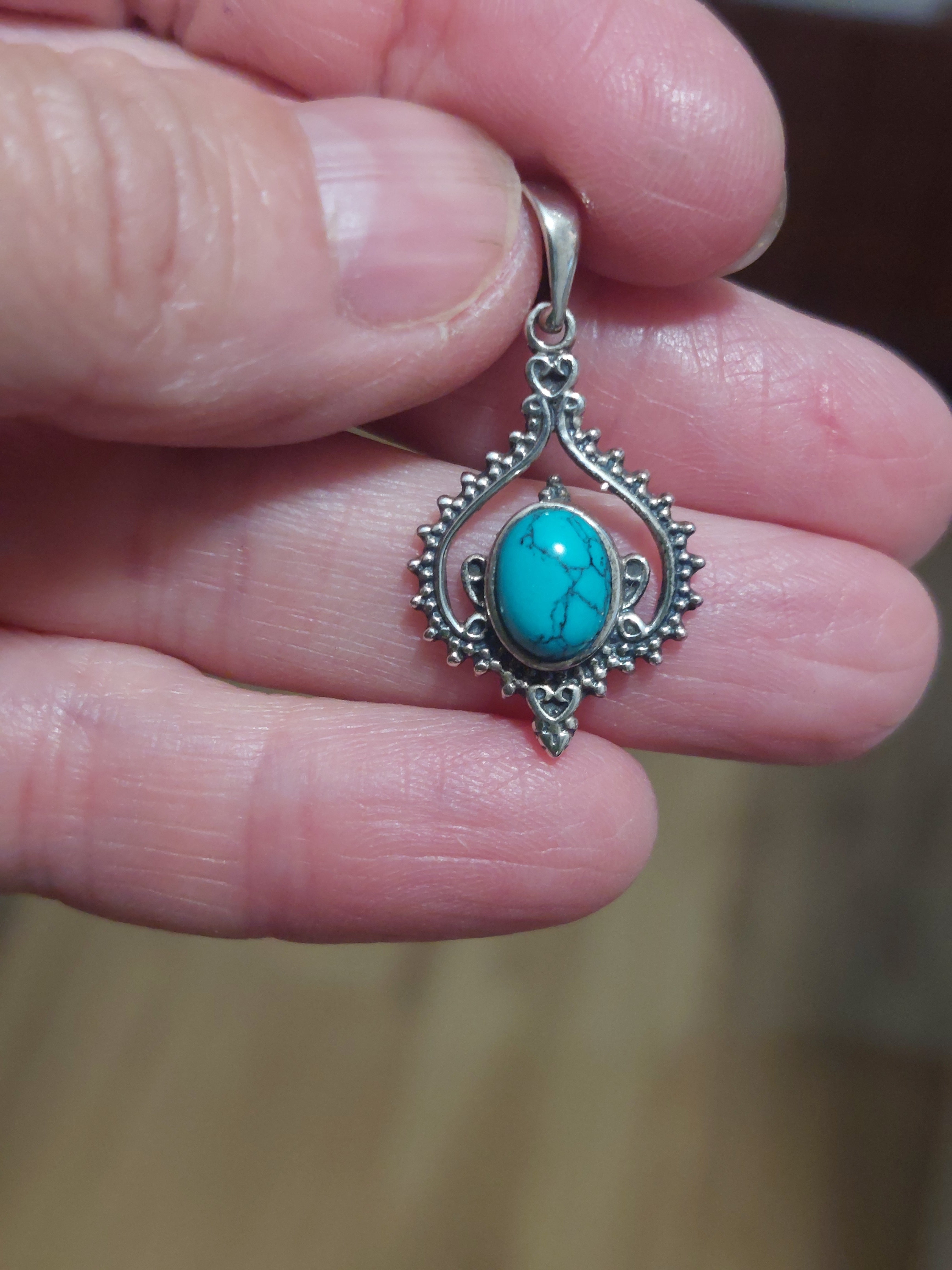 Turquoise Oval in Fancy Boho Inverted Heart Surround - 925 Sterling Silver