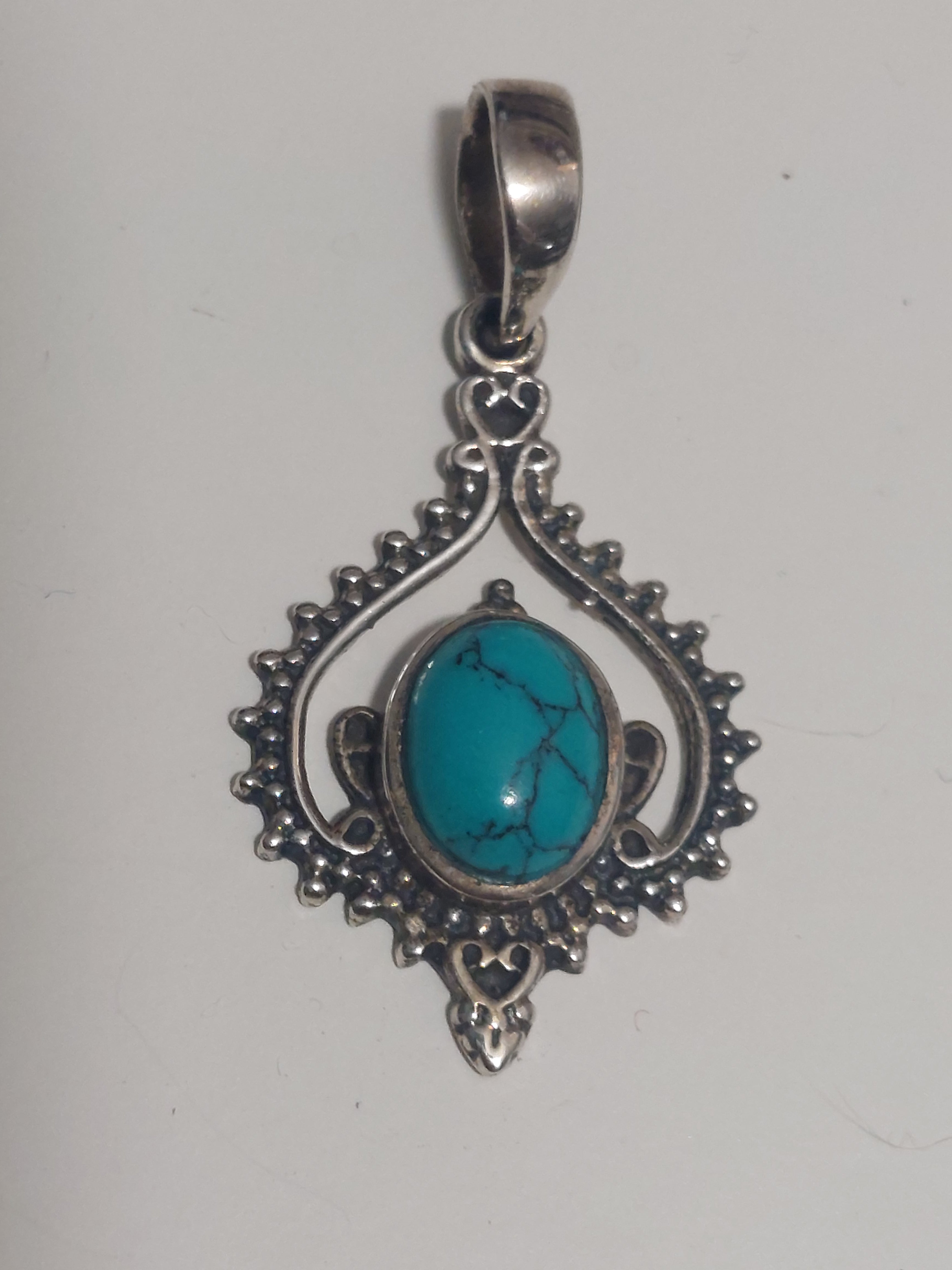 Turquoise Oval in Fancy Boho Inverted Heart Surround - 925 Sterling Silver