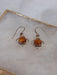 Sterling silver daisy outline with Cognac Amber round stone in centre