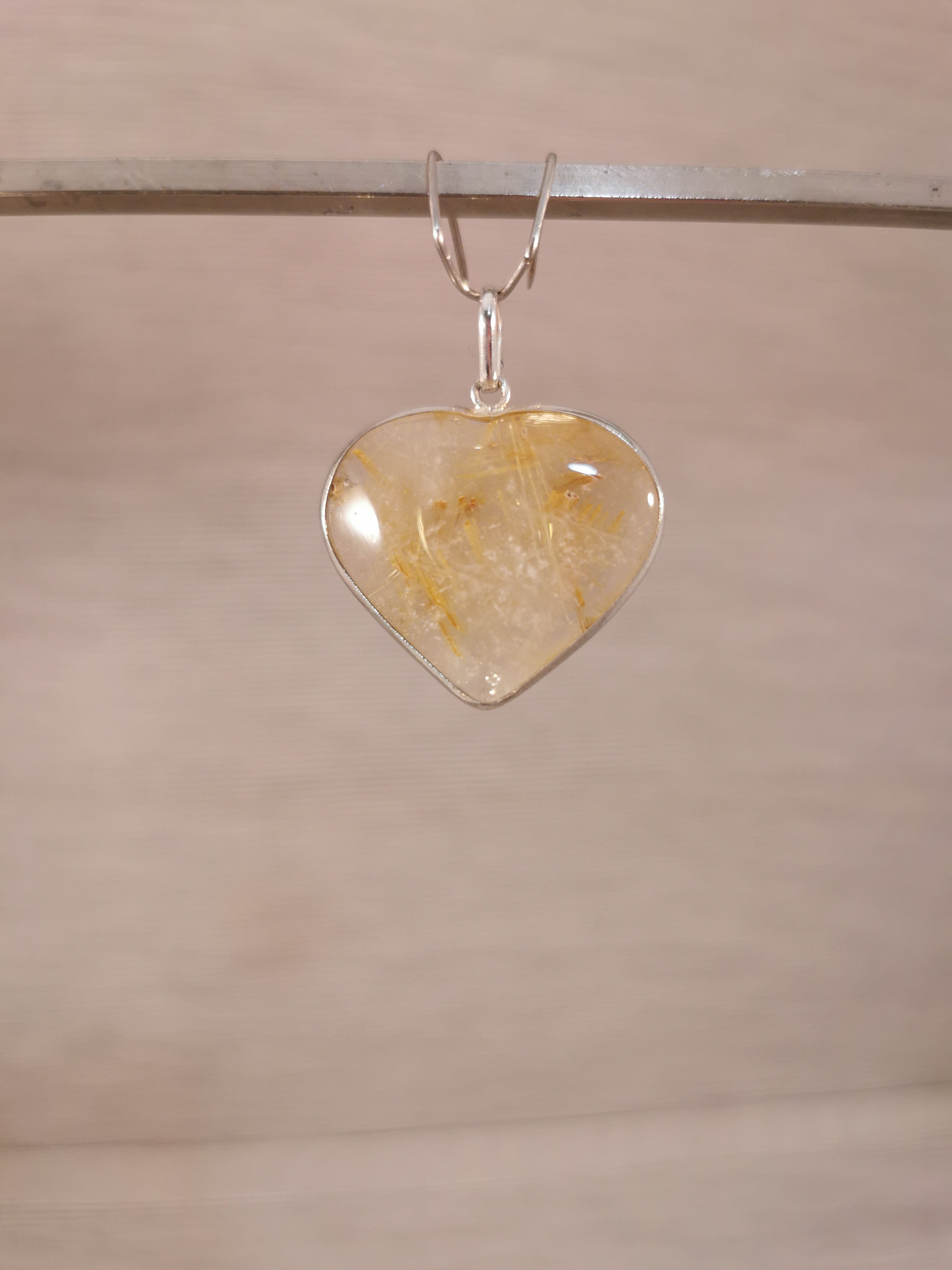 Rutilated Quartz Heart Pendant set in Sterling Silver