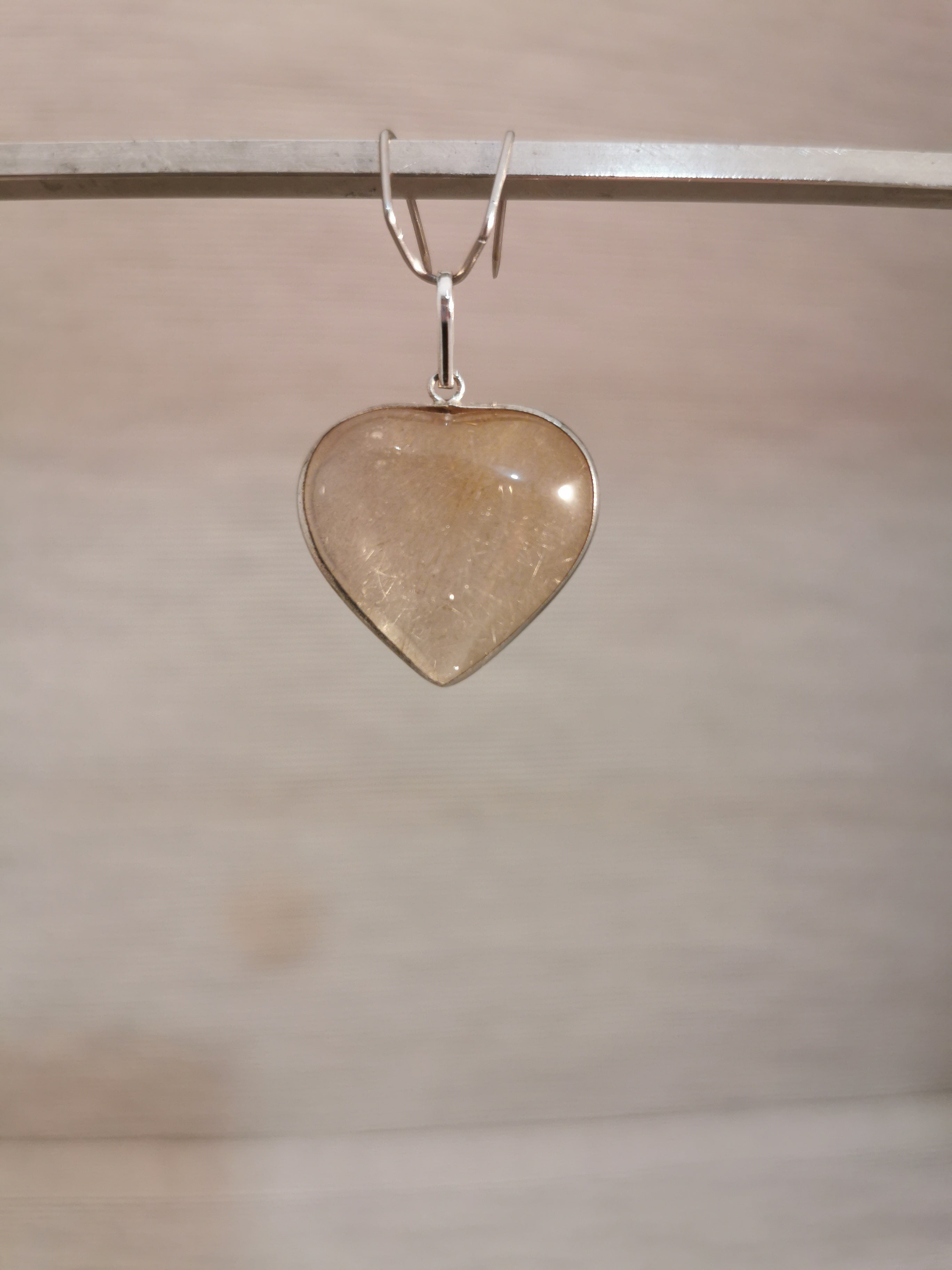 Rutilated Quartz Heart Pendant set in Sterling Silver