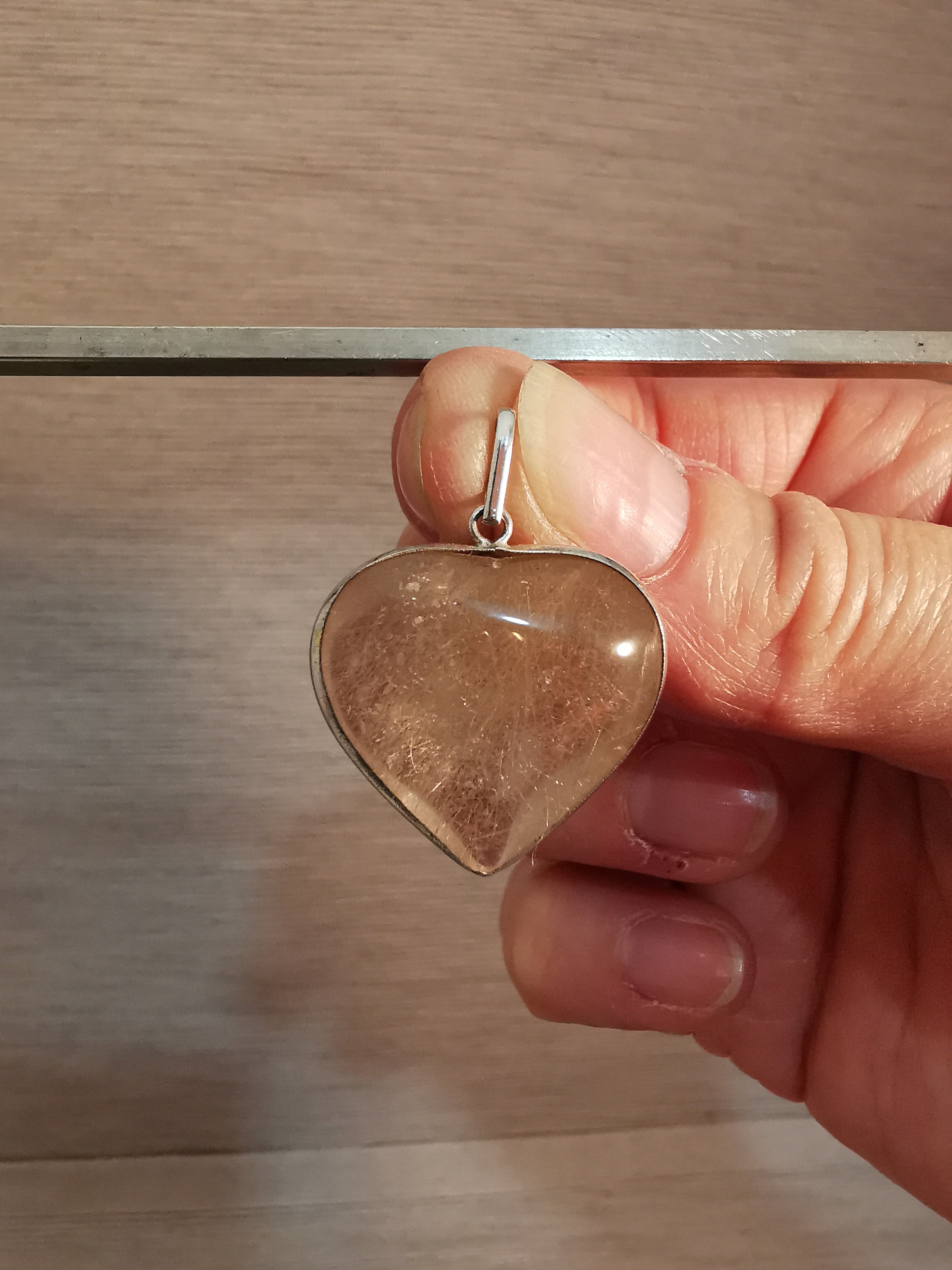 Rutilated Quartz Heart Pendant set in Sterling Silver