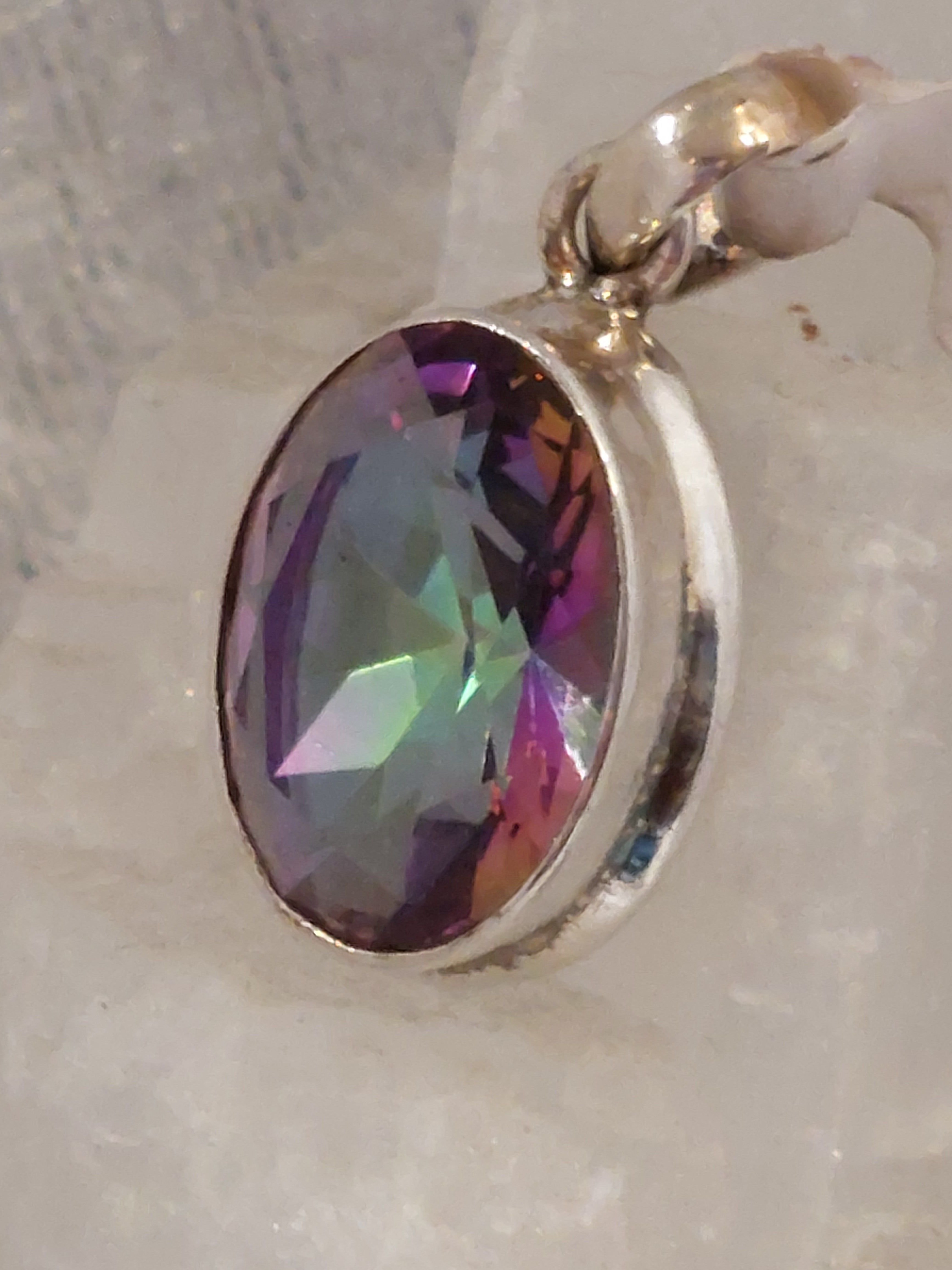 Mystic Topaz Faceted Oval Pendant - Sterling Silver
