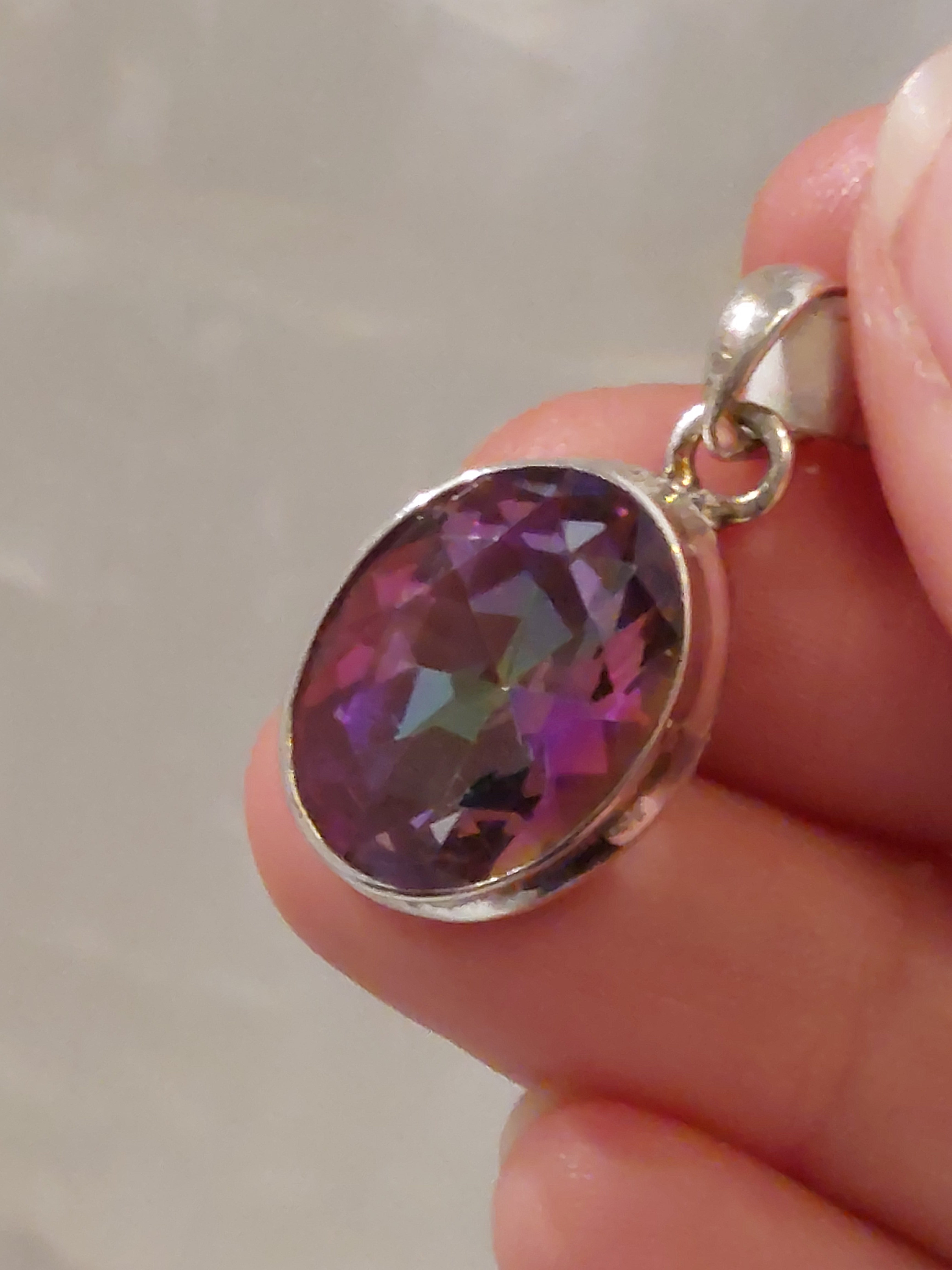 Mystic Topaz Faceted Oval Pendant - Sterling Silver